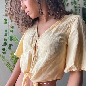 Cute yellow cropped tie shirt
